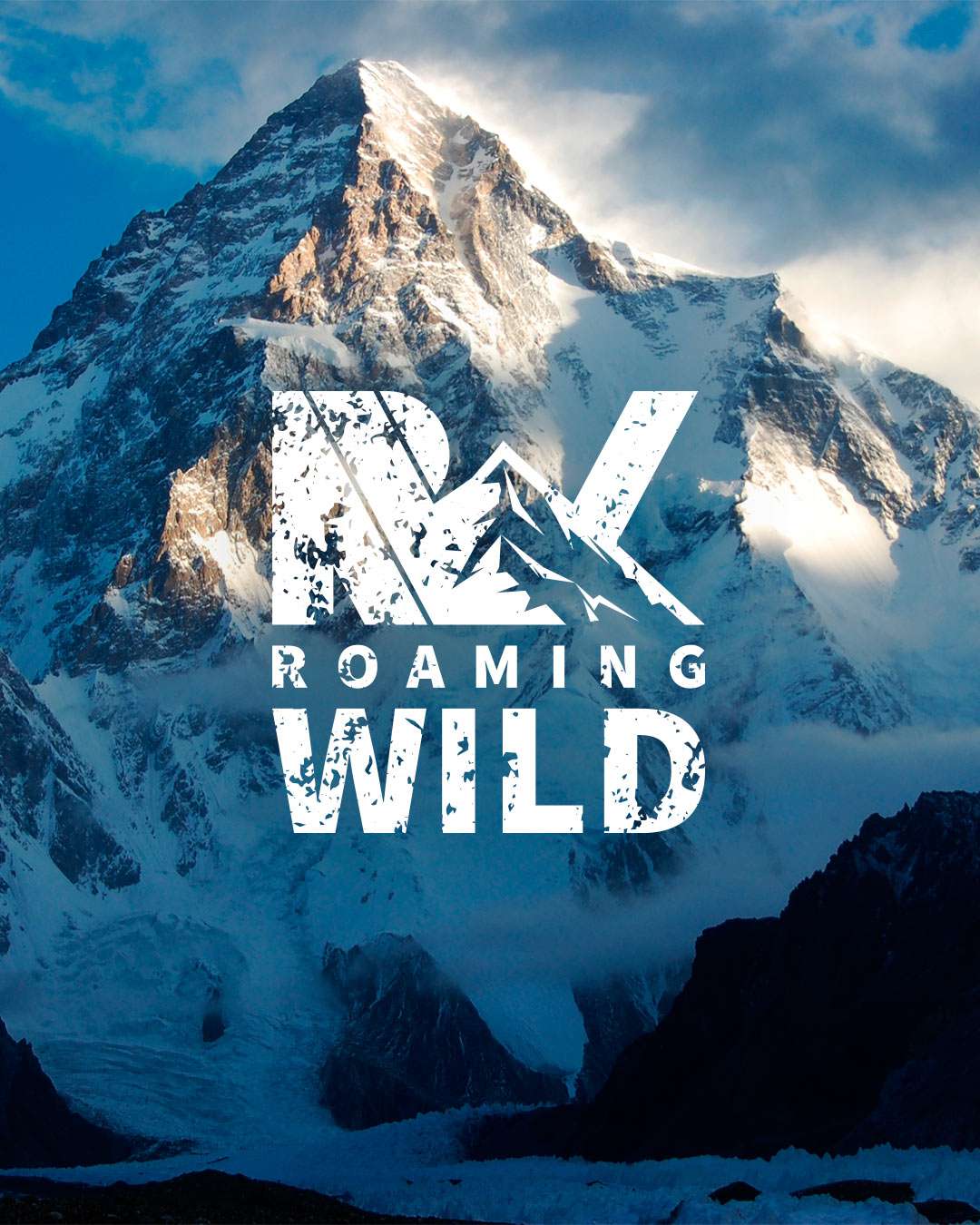 A scene of a massive, snowcapped Himalayan mountain overlayed with the Roaming Wild logo.